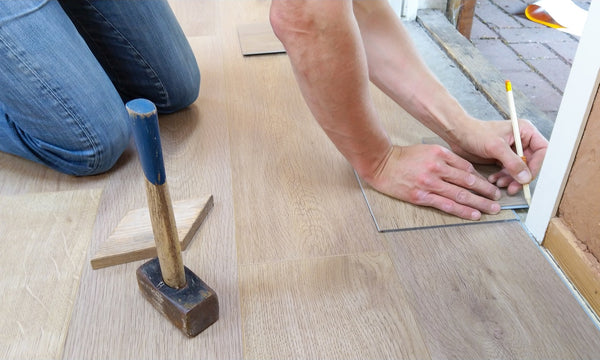 Installing wood flooring tiles